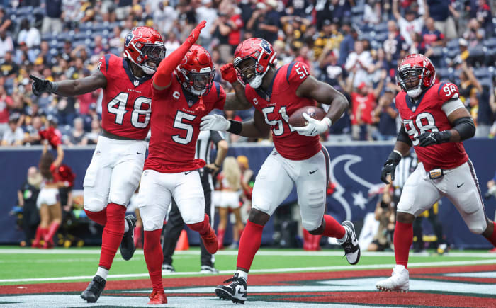 Texans defensive end Will Anderson Jr. (51) and safety Jalen Pitre (5) react after a play during the fourth quarter against the Pittsburgh Steelers at NRG Stadium.